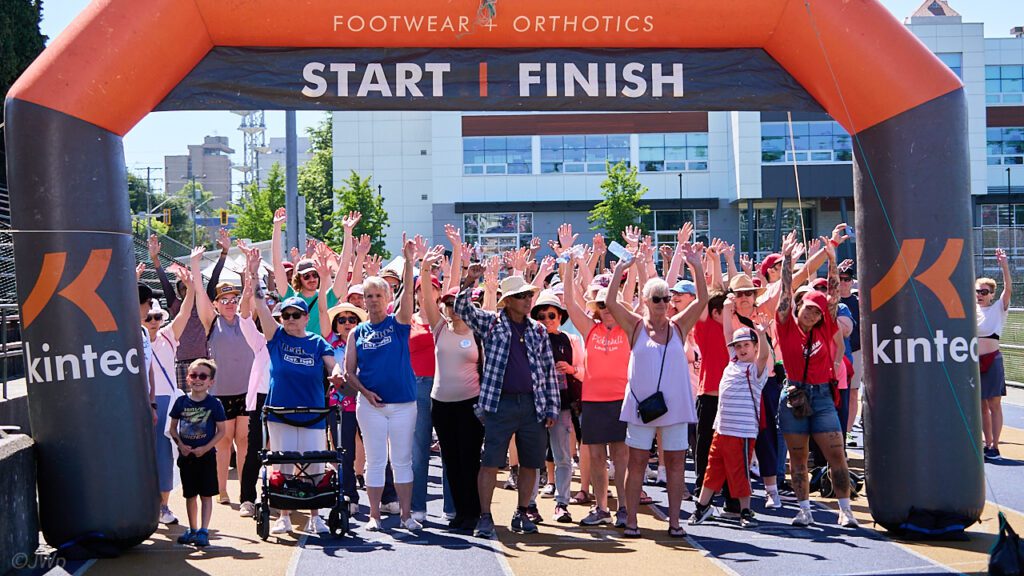 people at starting line of charity walk