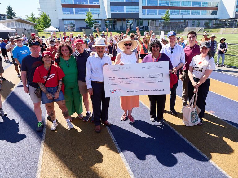 MLA Jennifer Whiteside announces funding for SHINE at Walk of Ages fundraiser.