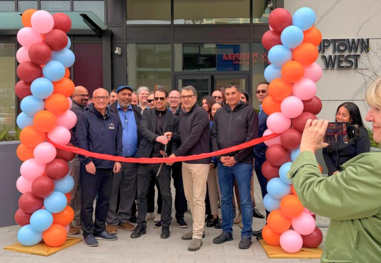 Cutting the ribbon on the Uptown West development.